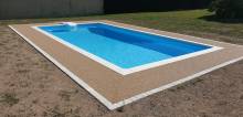 Aménager un contour de piscine antidérapant et sur mesure avec de la couleur à Feurs